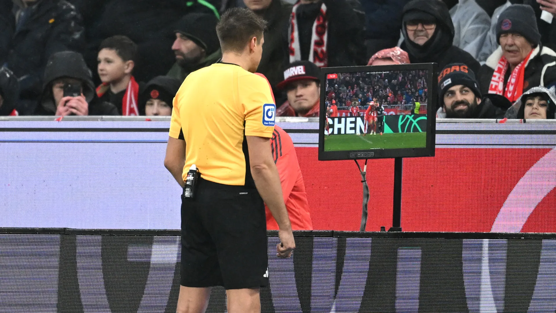 Referee Tobias Reichel looks at VAR screen during a game. (Getty Images)