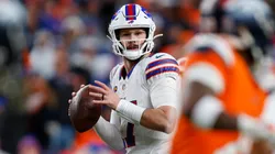 Josh Allen #17 of the Buffalo Bills looks to pass against the Denver Broncos in 2026.