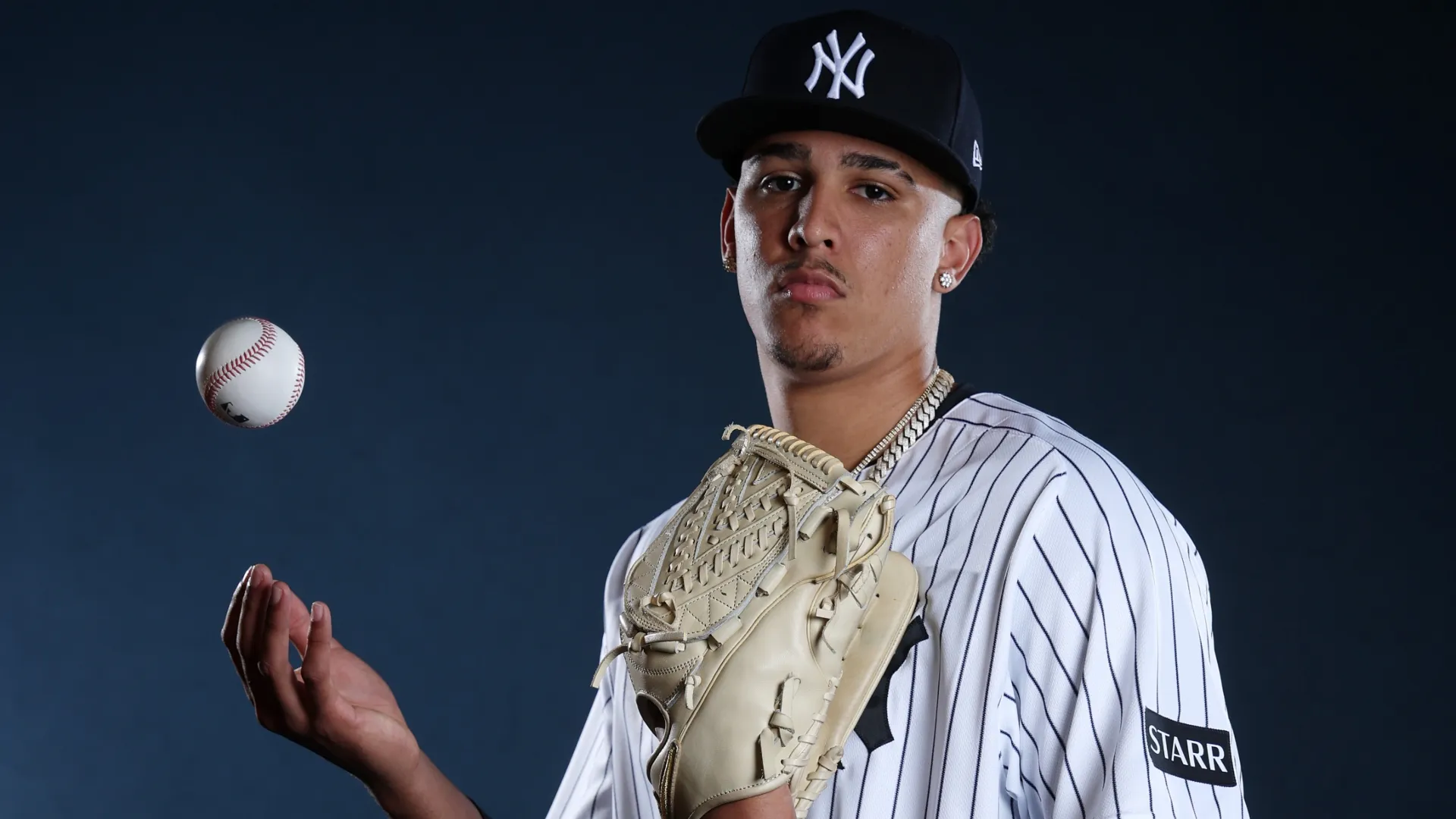 Carlos Lagrange #84 of the Yankees poses for a photo during Photo Day. Chris Graythen/Getty Images