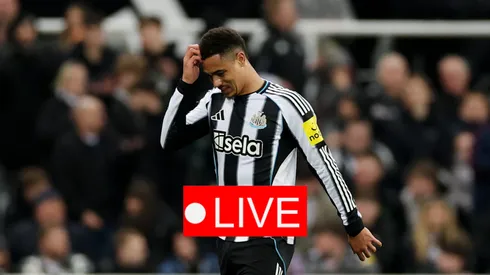 Jacob Ramsey is shown a red card during Newcastle's match against Manchester United
