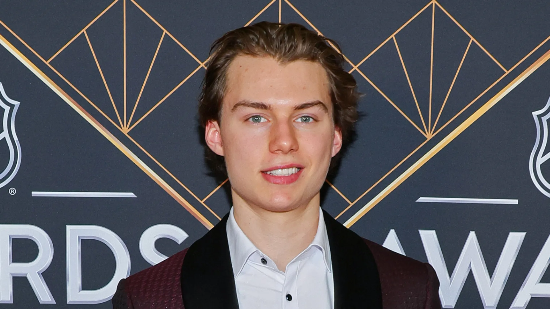 Connor Bedard smiles