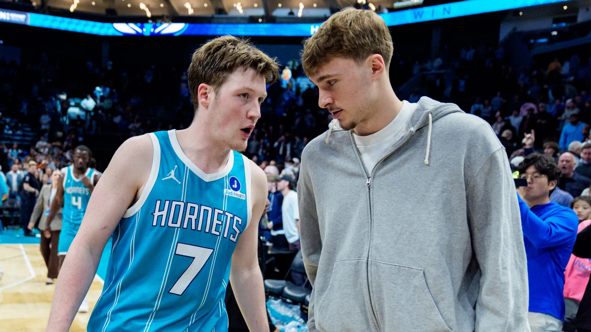 Kon Knueppel of the Charlotte Hornets talks with Cooper Flagg of the Dallas Mavericks. (Getty Images)