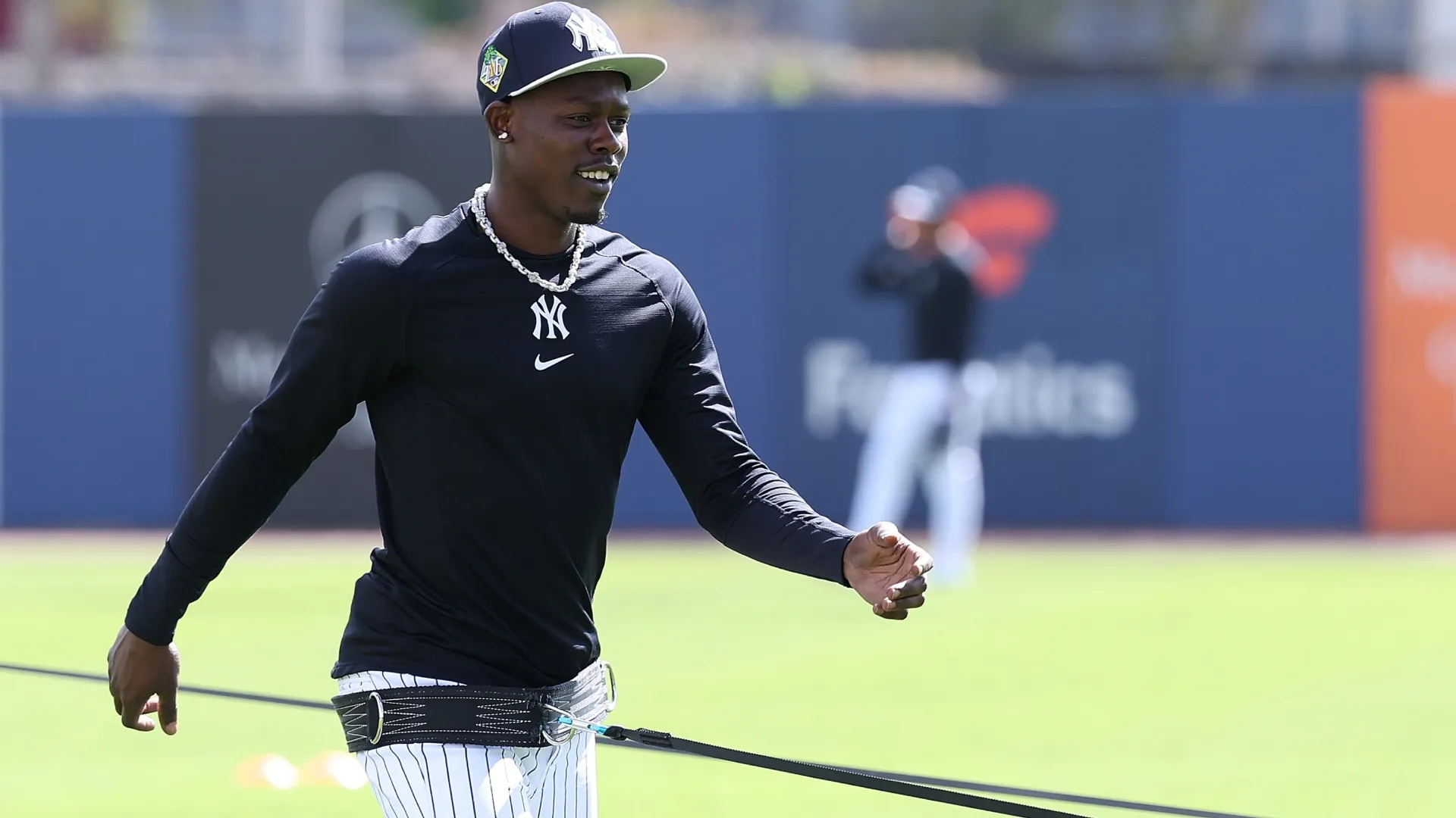 Jazz Chisholm Jr. #13 of the Yankees warms up during team workouts. Kevin C. Cox/Getty Images