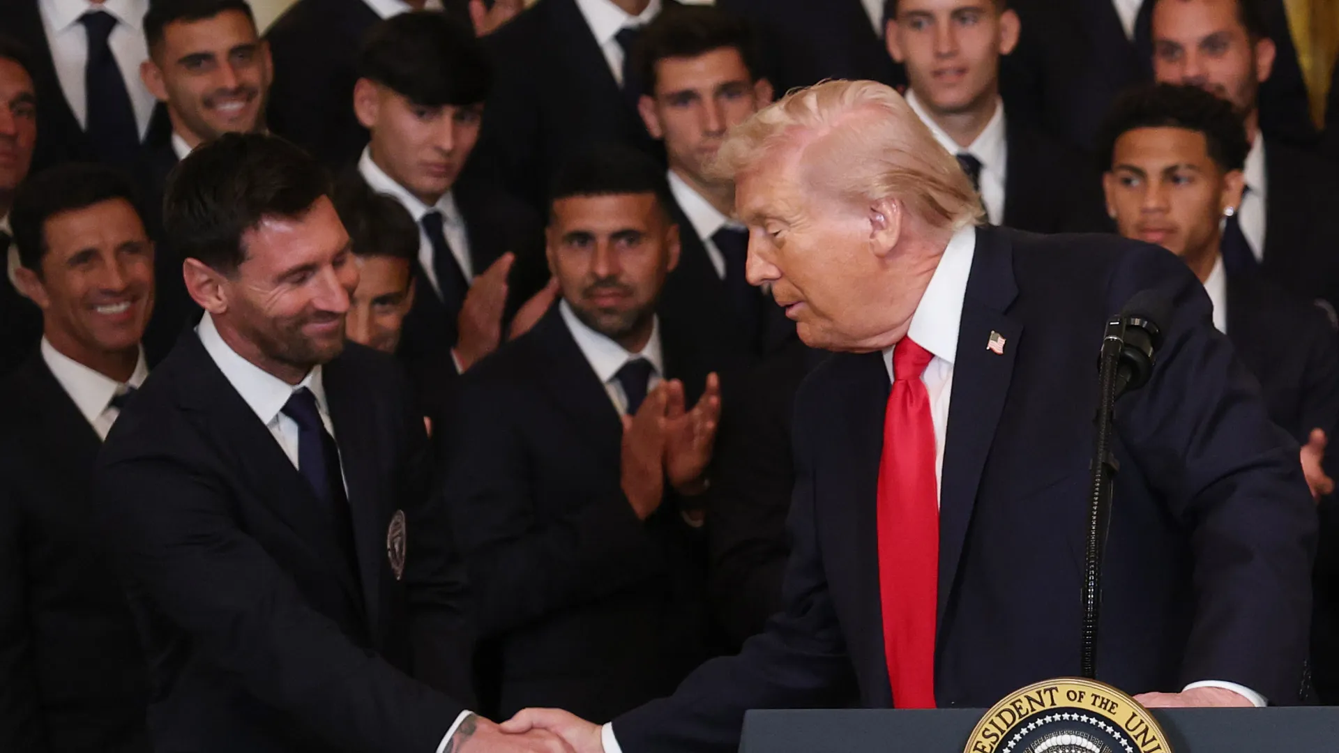 Lionel Messi of Inter Miami shakes hands with U.S. President Donald Trump.
