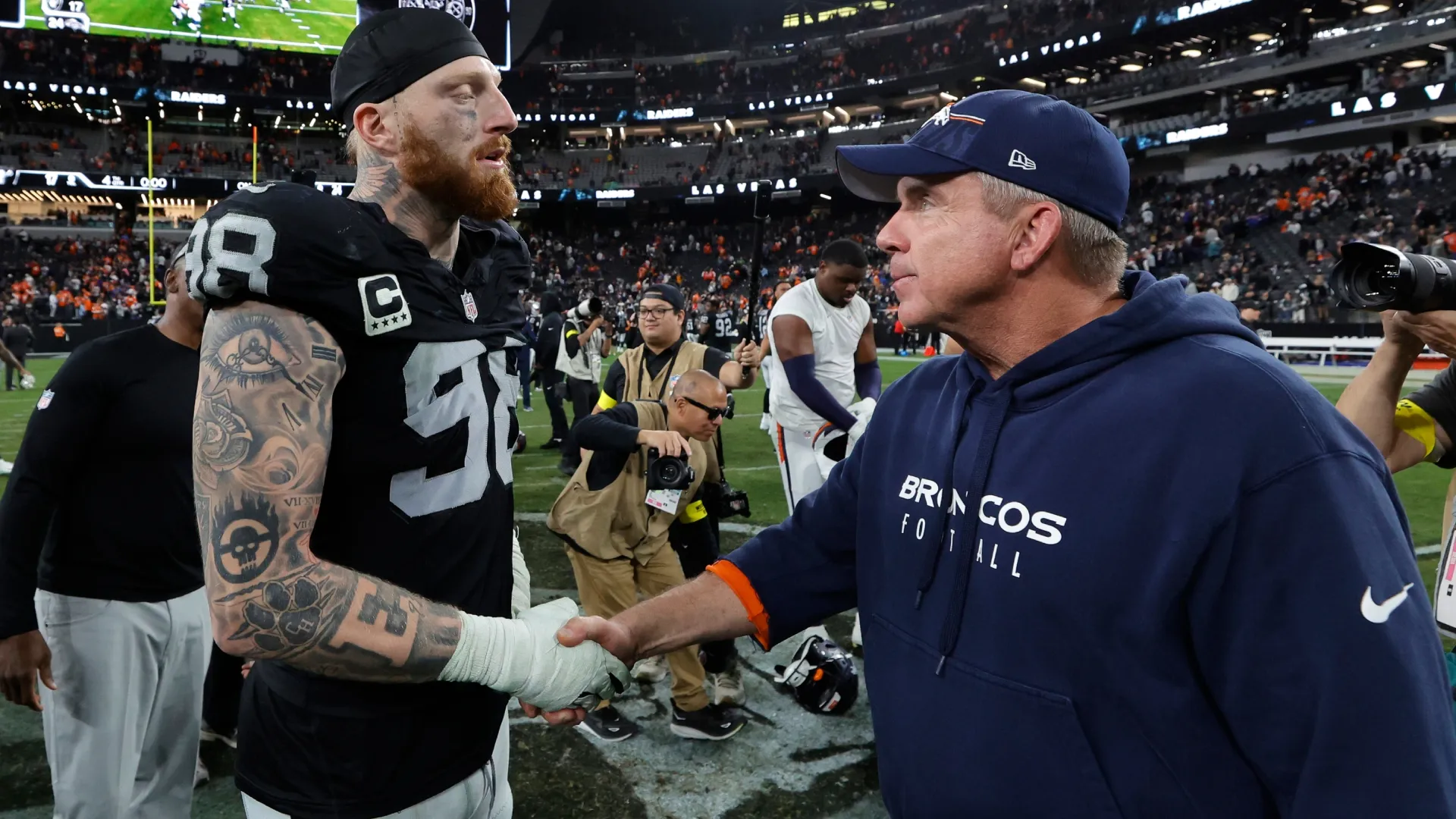 Maxx Crosby with Sean Payton