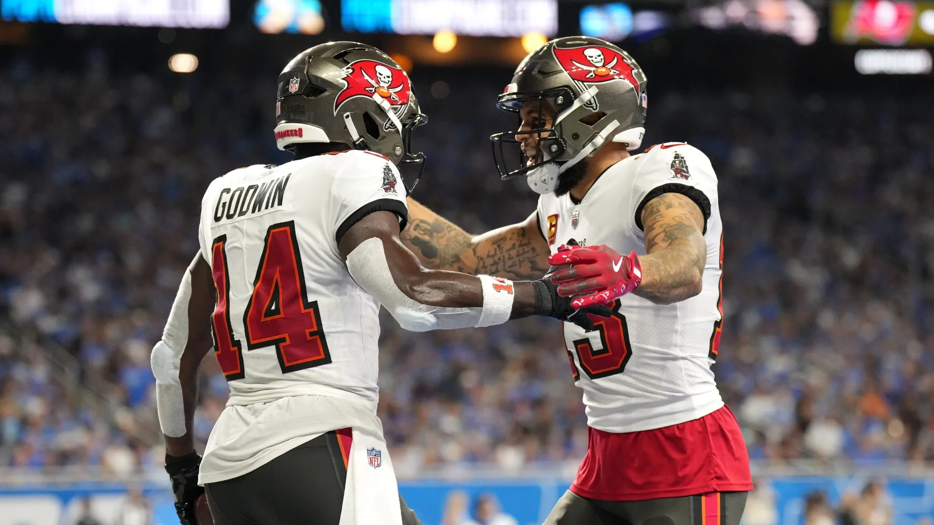  Chris Godwin #14 of the Tampa Bay Buccaneers celebrates with Mike Evans #13
