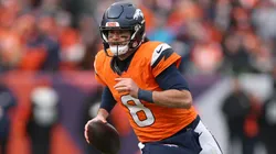 Jarrett Stidham #8 of the Denver Broncos rushes for yards in 2026.