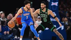Chet Holmgren #7 of the Oklahoma City Thunder and Jayson Tatum #0 of the Boston Celtics.