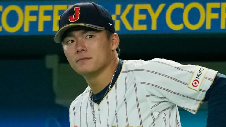 Yoshinobu Yamamoto #18 of Team Japan is introduced prior to the 2026 World Baseball Classic.