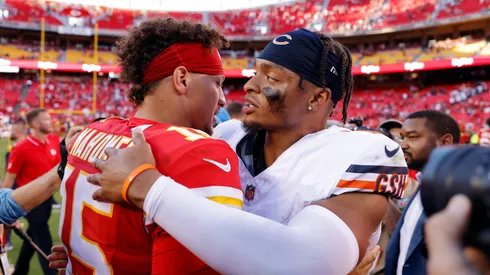 Patrick Mahomes (left) and Justin Fields hug after a game.