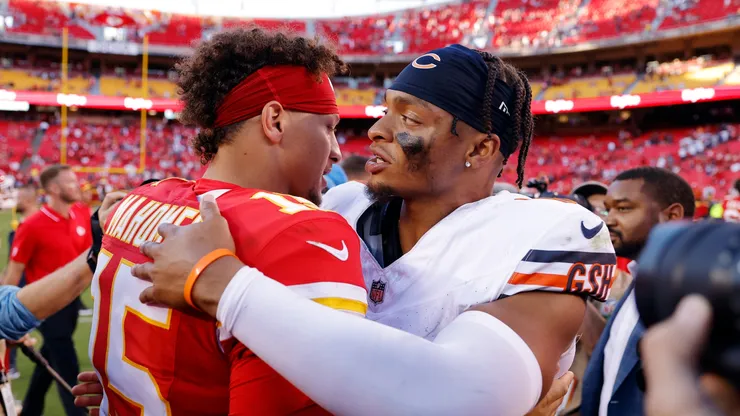 Patrick Mahomes (left) and Justin Fields hug after a game.