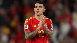 Pedro Porro of Spain applauds the fans.