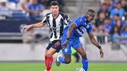 Jorge Rodríguez of CF Monterrey fights for the ball with Osinachi Ebere of Cruz Azul