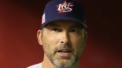 Manager Mark DeRosa #4 of Team USA walks the dugout.