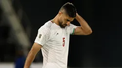 Milad Mohammadi of Iran leaves the pitch.
