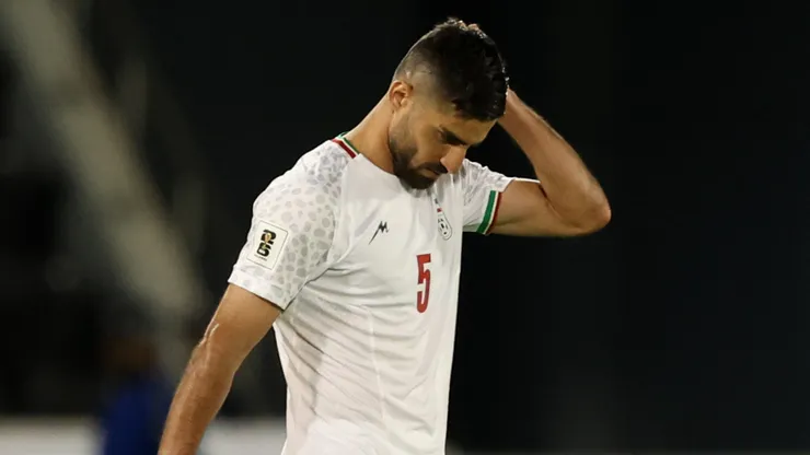 Milad Mohammadi of Iran leaves the pitch.