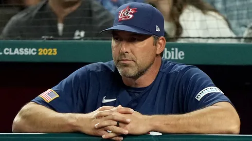 Manager Mark DeRosa looks on from the dugout.