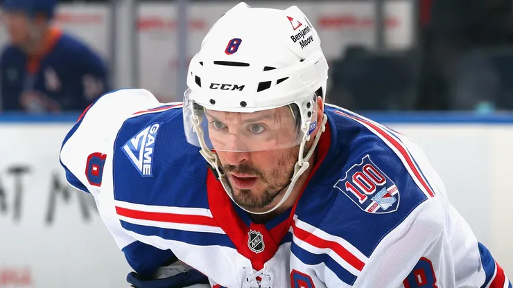 J.T. Miller #8 of the Rangers skates against the Islanders.
