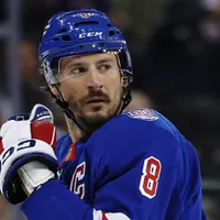 JT Miller receives support from Mike Sullivan and Rangers