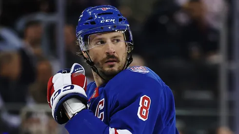 JT Miller receives support from Mike Sullivan and Rangers