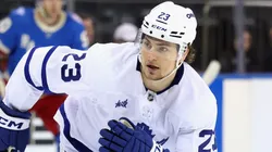 Matthew Knies #23 of the Maple Leafs skates against the Rangers.