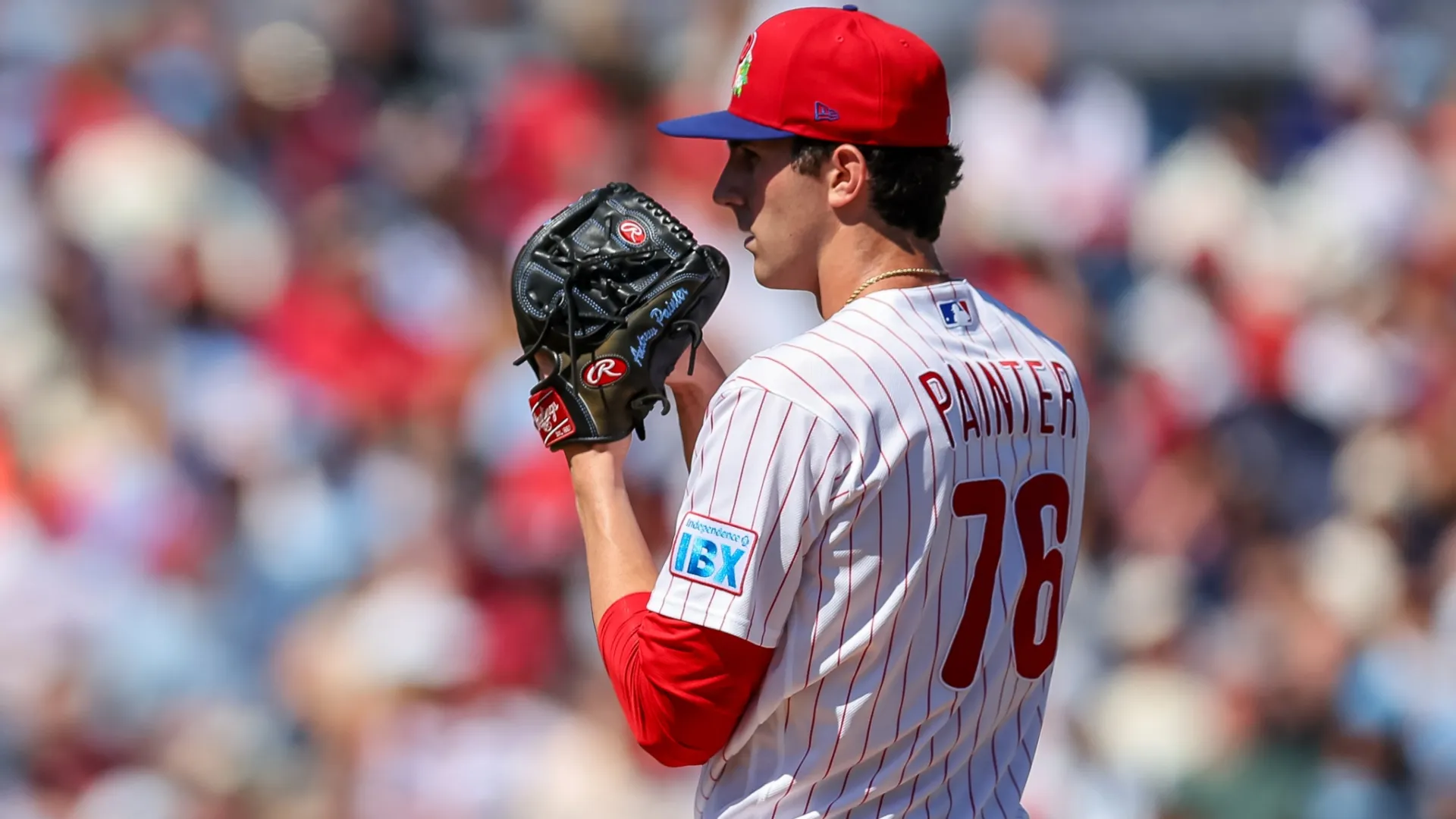 Andrew Painter #76 of the Phillies throws a pitch against the Yankees. Mike Carlson/Getty Images