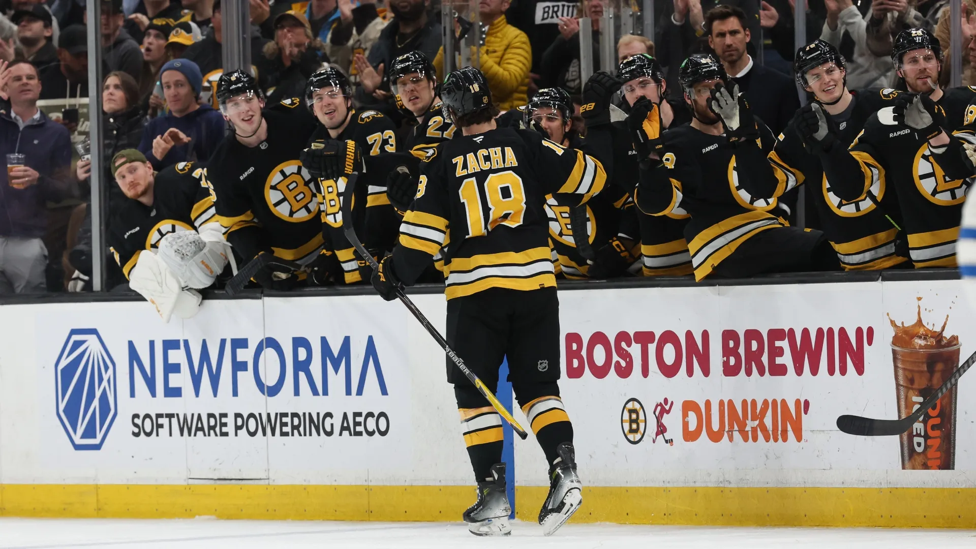 Pavel Zacha #18 of the Bruins celebrates his goal against the Jets. Rich Gagnon/Getty Images