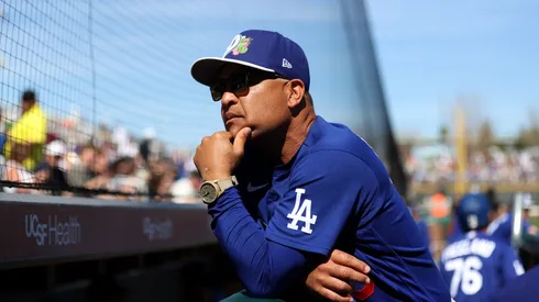 Manager Dave Roberts #30 of the Los Angeles Dodgers looks on.