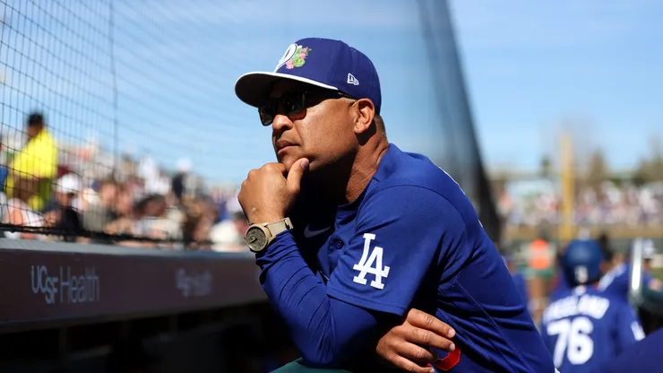 Manager Dave Roberts #30 of the Los Angeles Dodgers looks on.