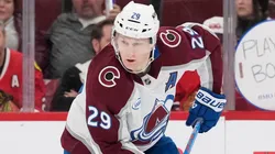 Nathan MacKinnon #29 of the Avalanche skates with the puck.