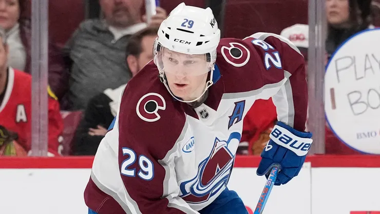 Nathan MacKinnon #29 of the Avalanche skates with the puck.
