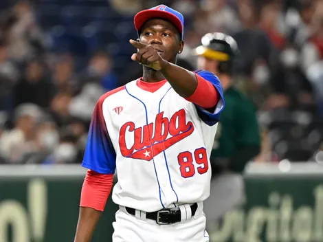 Why the reigning Japanese Pacific League MVP Livan Moinelo hasn’t reported to his team yet?