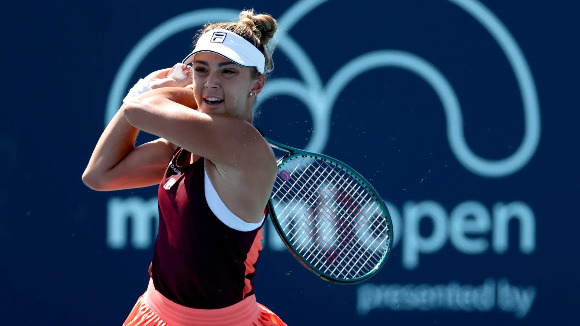 Jaqueline Cristian returns a shot to Ekaterina Alexandrova on Day 6 of the Miami Open (Source: Matthew Stockman/Getty Images)