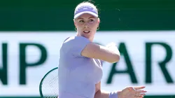 Talia Gibson returns a shot to Jasmine Paolini of Italy during Day 7 of the BNP Paribas Open.