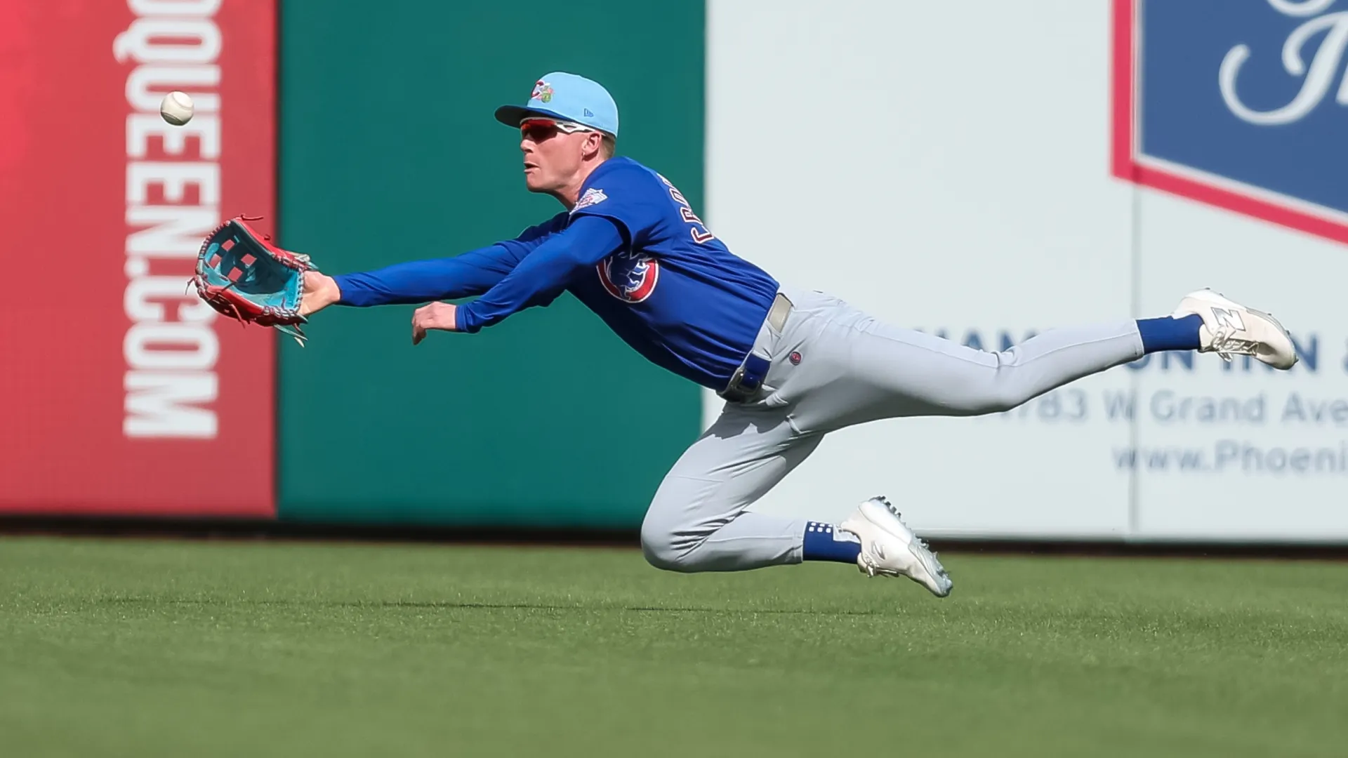 Pete Crow-Armstrong #4 of the Chicago Cubs dives for a catch. Mike Christy/Getty Images