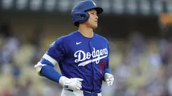 Shohei Ohtani #17 of the Los Angeles Dodgers runs to first.