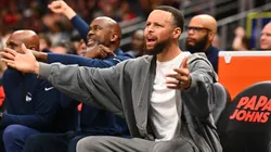 Stephen Curry #30 of the Golden State Warriors reacts from the bench.
