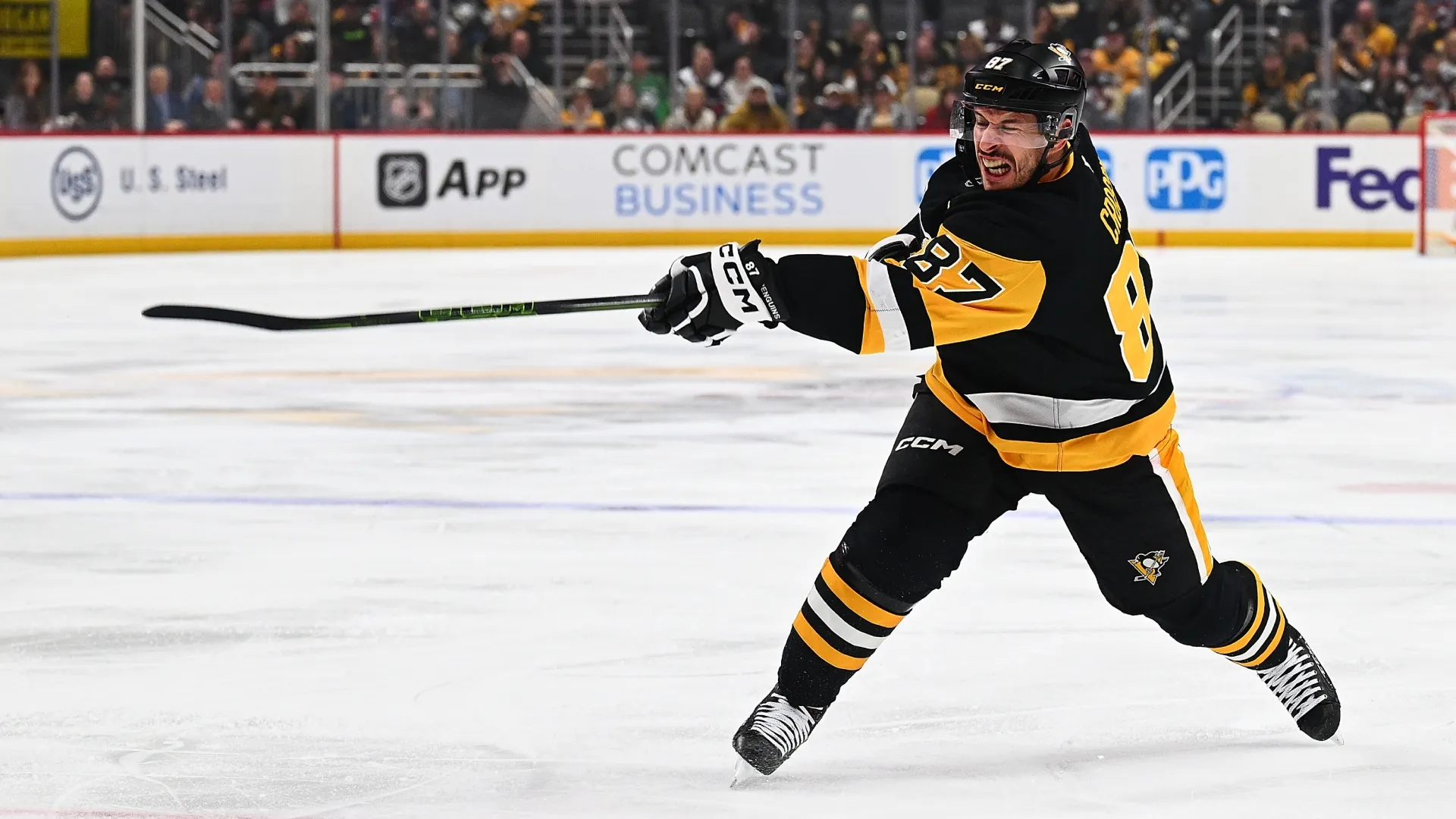 Sidney Crosby #87 of the Penguins attempts a shot in the first period during the game. Justin Berl/Getty Images