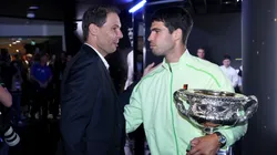Carlos Alcaraz of Spain with Rafael Nadal and the Norman Brookes Challenge Cup.
