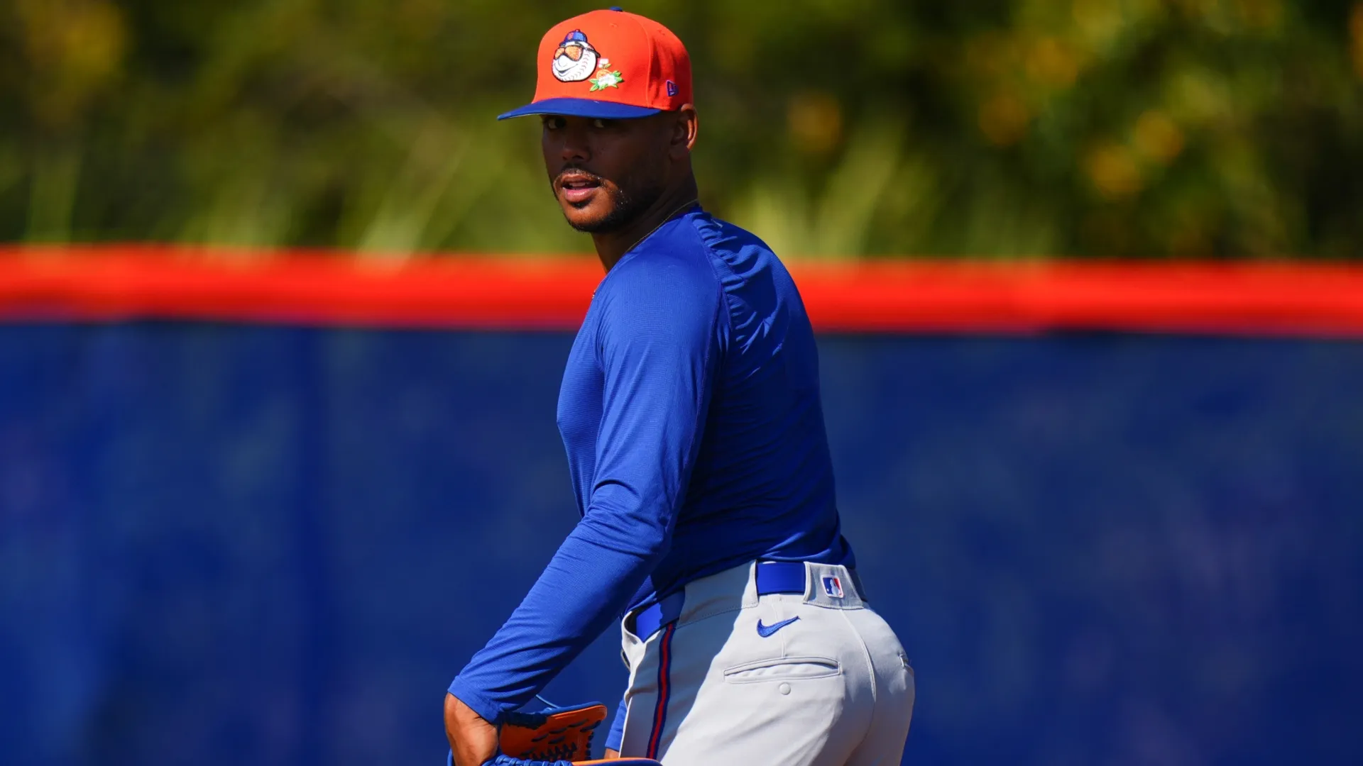Freddy Peralta #51 of the Mets looks on during spring training workouts. Rich Storry/Getty Images