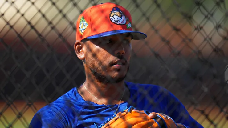 Freddy Peralta #51 of the New York Mets looks on during spring training workouts.