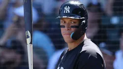 Aaron Judge #99 of the New York Yankees warms up on deck.
