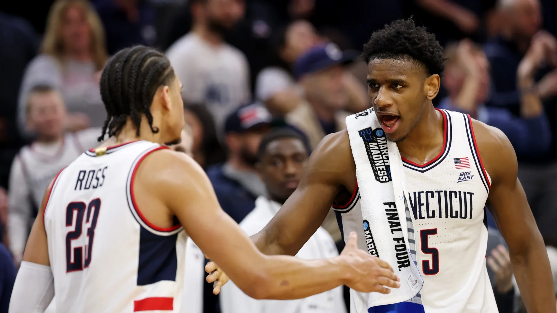 Jayden Ross #23 and Tarris Reed Jr. #5 of the UConn Huskies during the 2026 March Madness (Source: Emilee Chinn/Getty Images)