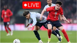 Maximiliano Araujo of Uruguay is challenged by Tino Livramento of England.