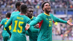 Ibrahim Mbaye of Senegal celebrates his team's first goal scored by teammate Nicolas Jackson.