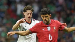 Matheus Nunes of Portugal and Brian Gutiérrez of Mexico.