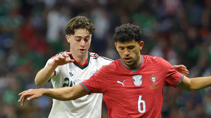 Matheus Nunes of Portugal and Brian Gutiérrez of Mexico.