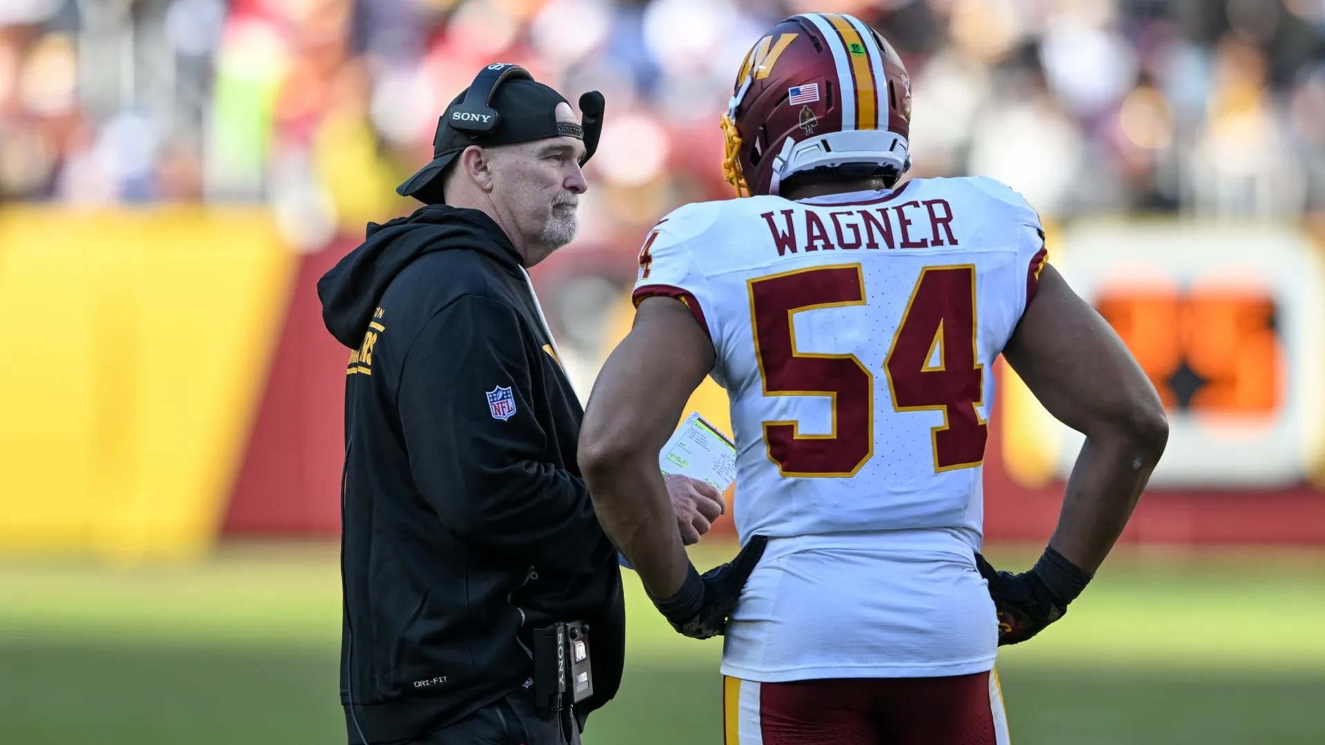 Dan Quinn with Bobby Wagner