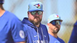 Manager John Schneider #14 of the Toronto Blue Jays looks on.