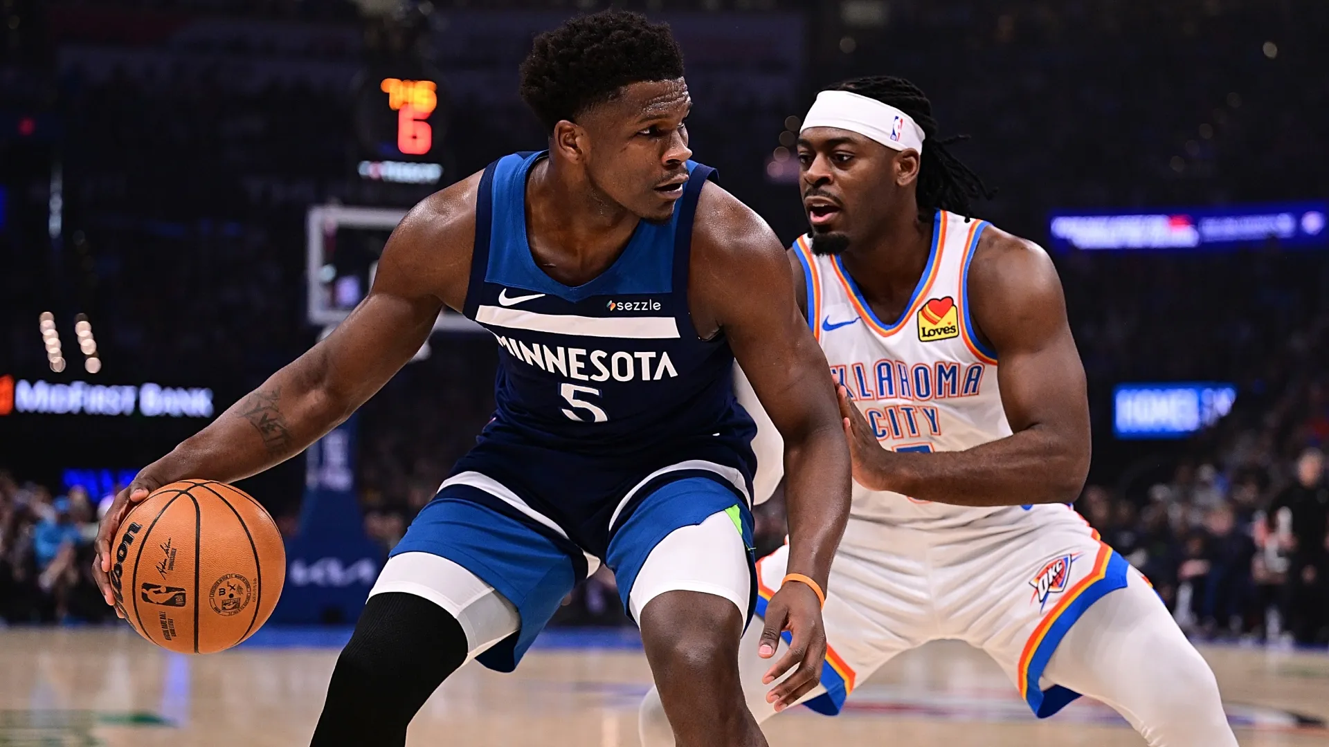 Anthony Edwards handles the ball while being defended by Luguentz Dort in 2026 (Source: Joshua Gateley/Getty Images)